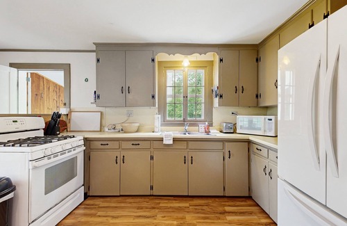 Chester Casa | Historic Vermont farmhouse in 100+ acres, balcony, sunroom, office, window a/c