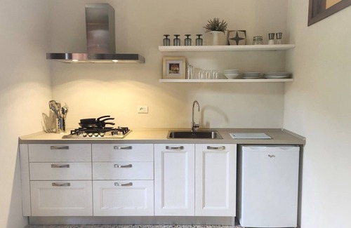 Chianni Apartamento | Historical home 3 bedroom 2 bath in Western Tuscany with magnificent views
