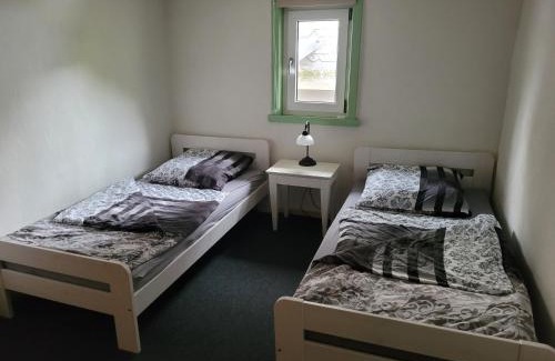 Holzhausen Casa | Historisches Ferienhaus "Schwalbennest" mit Eseln