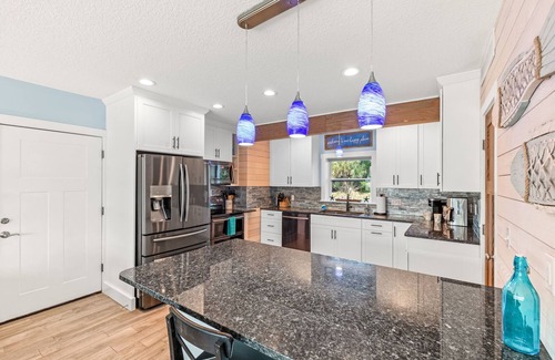Butler Beach Casa | History By Day Heaven By Night Waterfront Pool Oasis, Kayaks/Bikes Make Memories