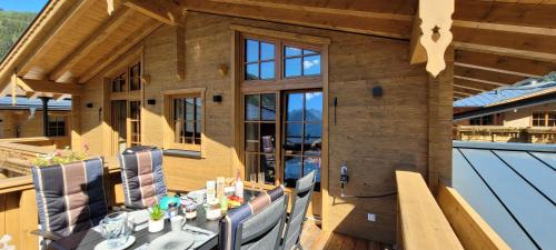 Rauris Apartamento | Hochalmbahnen Chalets Rauris 1-16 WE2, Maislaufeldweg 1p OG