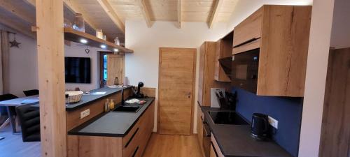 Rauris Apartamento | Hochalmbahnen Chalets Rauris 1-16 WE2, Maislaufeldweg 1p OG