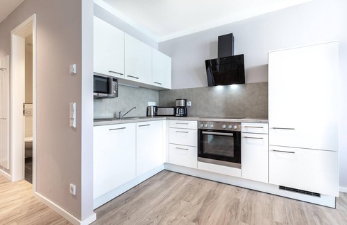 Alt-Travemunde/Ronnau Apartamento | Hochwertiges Apartment in Ostseenähe mit Sonniger Loggia und Hauseigenem SPA