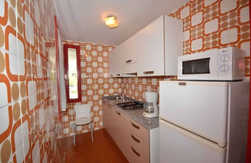Lignano Pineta Apartamento | Apartamento vacacional con aire acondicionado y terraza