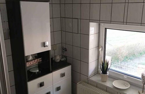 Lietzow Apartamento | Apartamento vacacional con vista sobre el "Jasmunder Bodden" y asientos de jardín