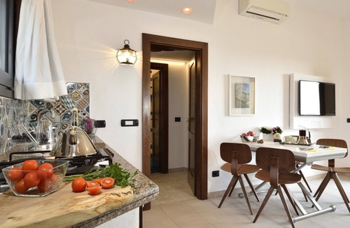 Porto San Paolo Apartamento | Holiday apartments L'Ea di Lavru SEA VIEW 3-rooms apartment-TOP INTERIOR DESIGN