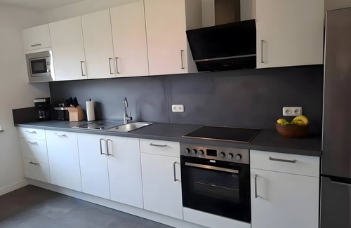 Friedrichskoog Apartamento | Apartamento vacacional 'Freiraum' con terraza privada, jardín junto al canal (Fleet) y Wi-Fi