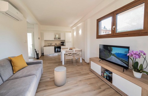 Carlazzo Apartamento | Apartamento vacacional "1" con vistas al lago, piscina compartida y jardín compartido