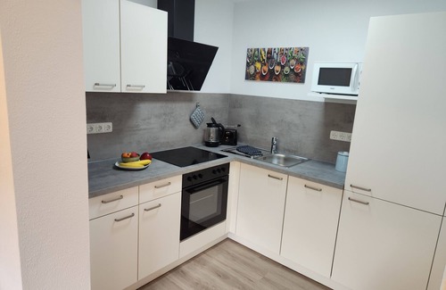 Iphofen Apartamento | Apartamento vacacional '5 Traminer' con vistas a la montaña, terraza compartida y Wi-Fi