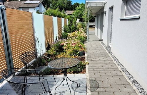 Murg Apartamento | Apartamento vacacional 'Am Hochrhein' con terraza privada, jardín compartido y wifi