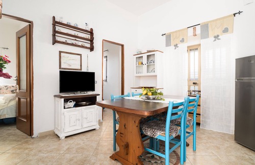 Irgoli Apartamento | Apartamento vacacional "Casa Masala" con terraza privada y jardín compartido