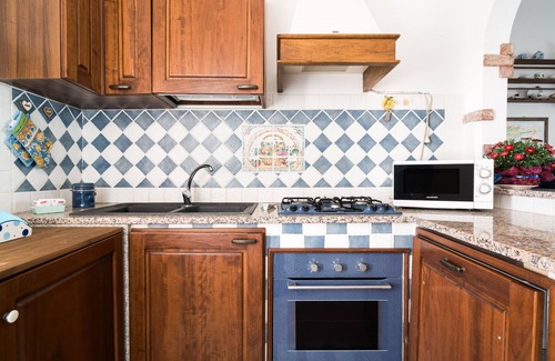 Irgoli Apartamento | Apartamento vacacional "Casa Masala" con terraza privada y jardín compartido