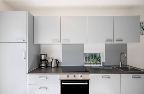 Dierhagen Ost Apartamento | Apartamento vacacional "Strandnaher Bungalow" con terraza privada y Wi-Fi
