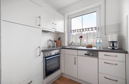 Marktoberdorf Apartamento | Apartamento vacacional 'Am Mühlbach' con jardín comunitario, balcón y Wi-Fi