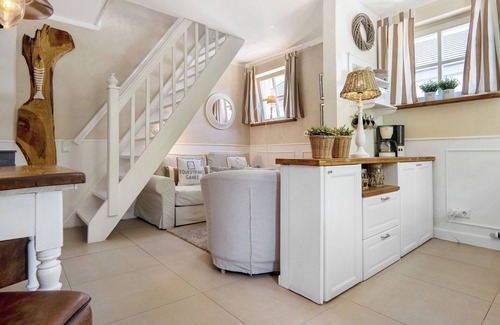Neuenkirchen Apartamento | Apartamento 'Gästewohnung Am See - Maisonette' con terraza privada, jardín privado y Wi-Fi