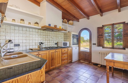 Ses Salines Apartamento | Apartamento vacacional "Es turo de Cabrera" con jardín, piscina y aire acondicionado