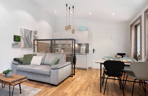 Strohen Apartamento | Apartamento vacacional "Eichengeflüster Waldhütte" con gran terraza cubierta en Ströhen
