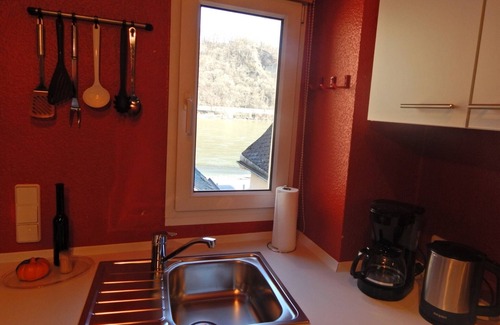 Neuendorf Apartamento | Apartamento vacacional 'Ferienhaus Rheinblick Wohnung 4' con terraza comunitaria, Wi-Fi y aire acondicionado
