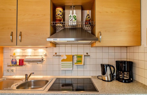 Riepe Apartamento | Apartamento vacacional "Gerken Amselnest" con terraza privada, jardín privado y wifi