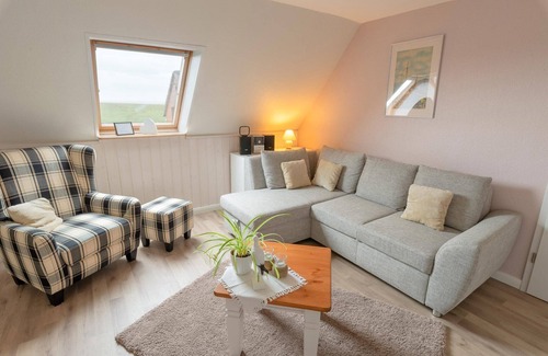 Langeneß Apartamento | Apartamento vacacional 'Haus Süderkamp' con vistas al lago y Wi-Fi