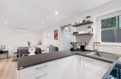 Otigheim Apartamento | Apartamento vacacional 'Hochwertige Ferienwohnung Ötigheim' con jardín comunitario, wifi y aire acondicionado