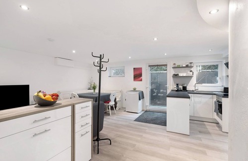 Otigheim Apartamento | Apartamento vacacional 'Hochwertige Ferienwohnung Ötigheim' con jardín comunitario, wifi y aire acondicionado