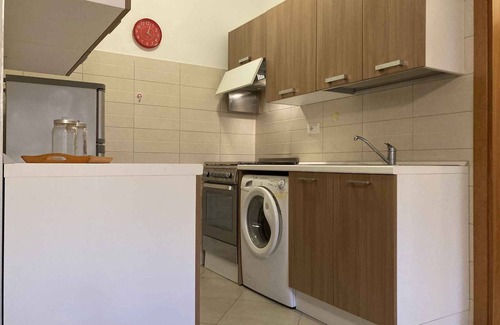 Rosapineta Apartamento | Apartamento vacacional con aire acondicionado, lavadora y balcón