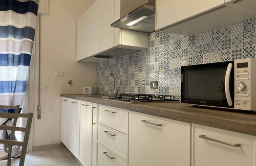 Rosolina Mare Apartamento | Apartamento vacacional con aire acondicionado y balcón