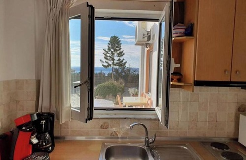 Mirtos Apartamento | Apartamento vacacional "Kallithea" con vistas al mar, 2 terrazas compartidas y Wi-Fi