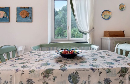 Avegno Apartamento | Apartamento vacacional "Le Cicale a Due Passi dal Mare" con jardín compartido