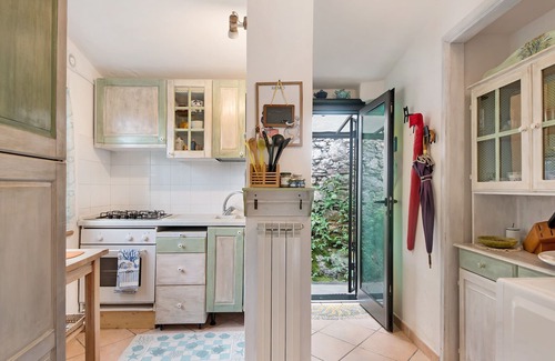 Avegno Apartamento | Apartamento vacacional "Le Cicale a Due Passi dal Mare" con jardín compartido