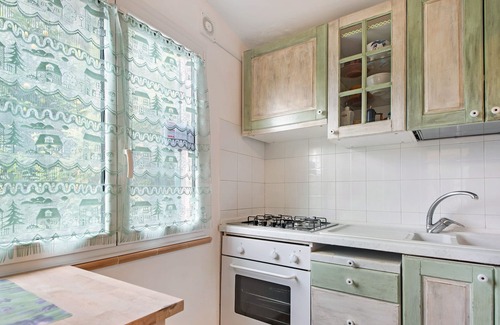 Avegno Apartamento | Apartamento vacacional "Le Cicale a Due Passi dal Mare" con jardín compartido