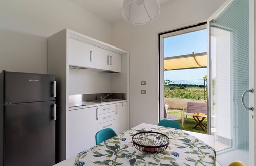 Galatone Apartamento | Apartamento vacacional "Le Scuderie 4" con piscina compartida, terraza compartida y Wi-Fi