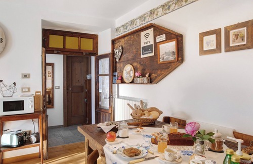 Teglio Apartamento | Apartamento vacacional "Mantaula" con vistas a la montaña, terraza compartida y Wi-Fi