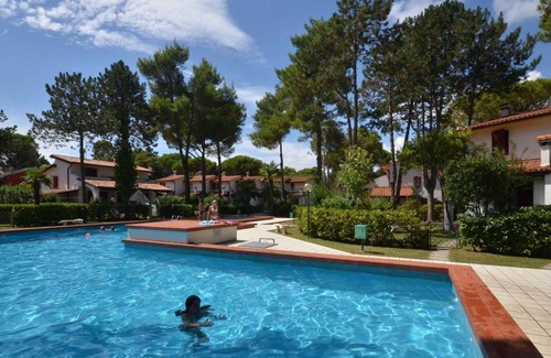 Bibione Lido dei Pini Apartamento | Apartamento vacacional Con terraza, barbacoa y jardín.