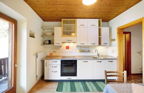 Redagno Apartamento | Apartamento vacacional "Pischlhof Apt Lärche" con vistas a la montaña, balcón y jardín compartido