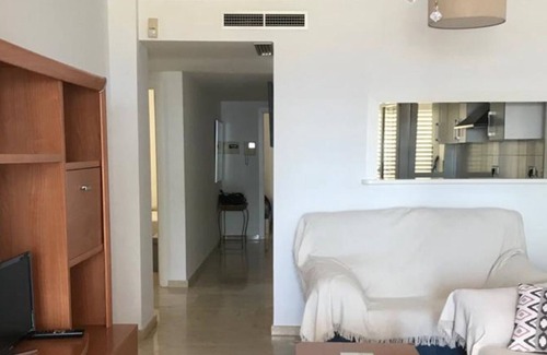 Garrucha Apartamento | Apartamento vacacional "Primera Linea Marina Del Faro" con vistas al mar, piscina compartida y Wi-Fi