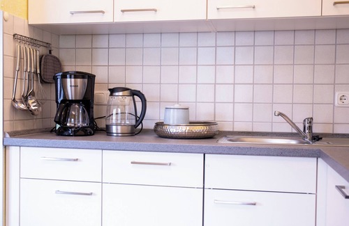 Iphofen Apartamento | Apartamento vacacional 'Scheurebe' con balcón privado, terraza y jardín comunitarios