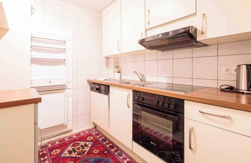 Huben Apartamento | Apartamento vacacional sala de Tirol, con estufa de azulejos y lavavajillas