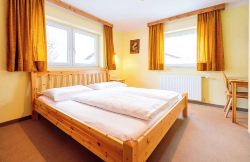 Huben Apartamento | Apartamento vacacional sala de Tirol, con estufa de azulejos y lavavajillas