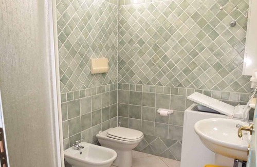 Porto Ottiolu Apartamento | Holiday apartment with three rooms with 6 beds in the basement