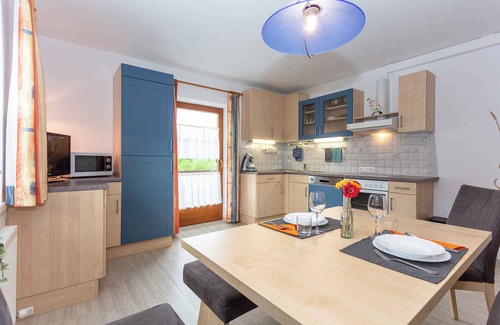 Walchsee Apartamento | Apartamento vacacional con jardín, cama elástica y unas vistas preciosas