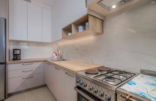 Porat Apartamento | Apartamento vacacional con jardín y barbacoa