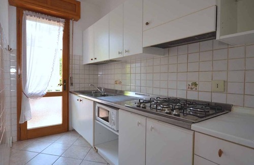 Lignano Pineta Apartamento | Apartamento vacacional con piscina en zona verde