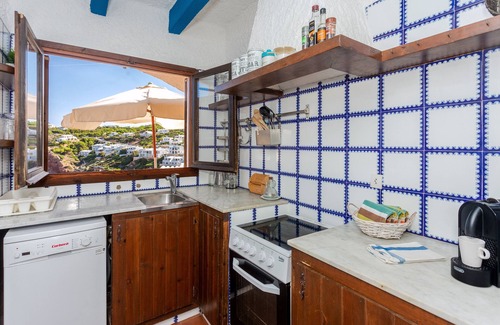 Ciutadella de Menorca Casa | Casa de vacaciones "Vacaciones en Cala Morell" que admite mascotas, con vistas al mar y jardín