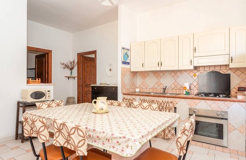 Scano di Montiferro Casa | Casa de vacaciones 'La Casa Rosa Di Rita E Franco' con balcón y Wi-Fi
