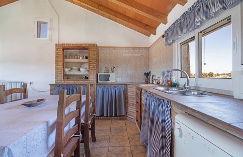 Barbate Casa | Casa de vacaciones 'Casa Andrea' con vistas a la montaña, piscina compartida y Wi-Fi