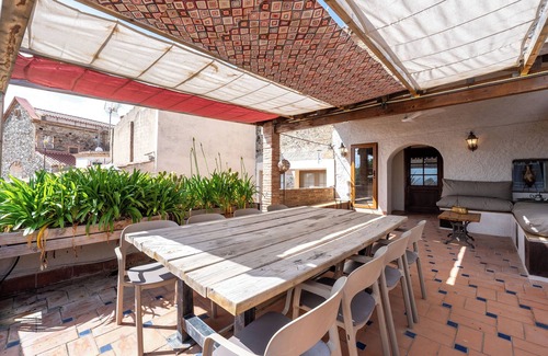 Almoster Casa | Casa de vacaciones 'Casa Rústica Cal Mian' con vistas a la montaña, Wi-Fi y aire acondicionado