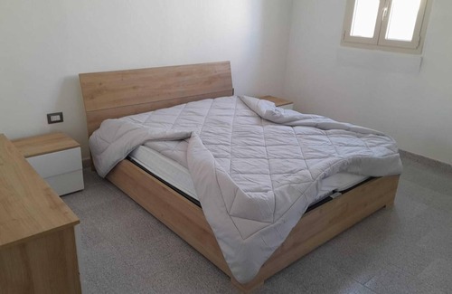 Portoscuso Casa | Casa de vacaciones 'Casa Vacanze GG 13' con vistas al mar, jardín y aire acondicionado