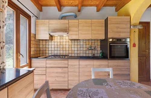 Rialto Casa | Casa de vacaciones 'Del Fiume' con vistas a la montaña y jardín privado